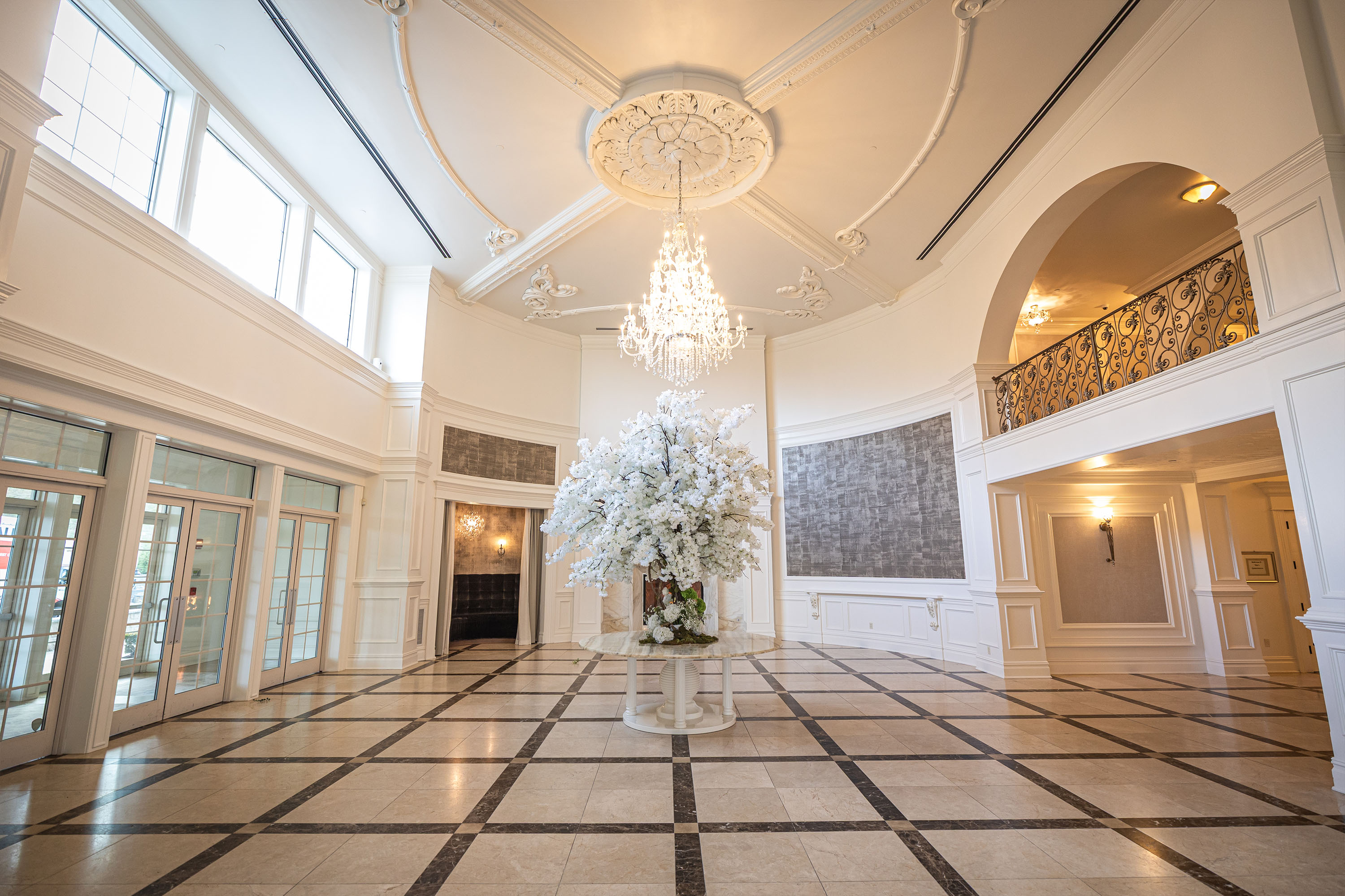 aria grand foyer with an elegant display in the center