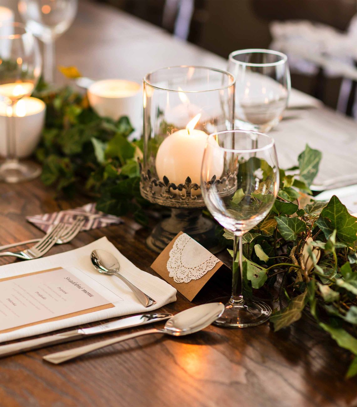 wooden table set for dinner with
